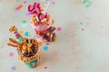 Top view of two freak shakes on party background with copyspace Royalty Free Stock Photo