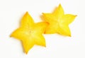Top View of Two Fresh Ripe Starfruit Slices on White Background