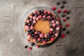 Two-layer cheesecake decorated with berries