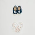 Top view of two pairs of baby shoes