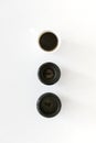 Top view of two photographic lenses and white coffee mug Royalty Free Stock Photo