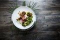 Top view two tasty pieces of grilled ribs with vegetables Royalty Free Stock Photo