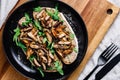 Top view of two vegan sandwiches with fresh arugula, fried shiitake mushroom Royalty Free Stock Photo