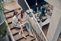 Top view of two young modern women in smart casual wear