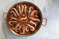 Top view of typical spanish seafood paella in traditional pan Royalty Free Stock Photo