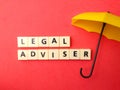 Top view umbrella and toys word with text LEGAL ADVISER