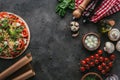 Top view of uncooked pizza with ingredients Royalty Free Stock Photo