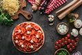 top view of uncooked pizza with ingredients Royalty Free Stock Photo