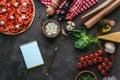 top view of uncooked pizza with notebook Royalty Free Stock Photo