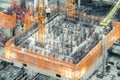 Top view of an under construction building. Civil engineering, industrial development project, tower basement infrastructure Royalty Free Stock Photo