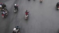 Top view of unidentified people on motorbikes, riding fast during rush hour, high traffic, only motorcycles