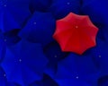 Top view of unique red umbrella standing out from the blue crowd Royalty Free Stock Photo