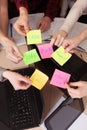 United hands stickers lesson school table computer business team work space top view class mate group Royalty Free Stock Photo