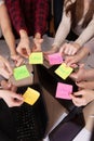 United hands stickers lesson school table computer business team work space top view class mate group