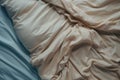 Top view of an unmade bed with a crumpled sheet Royalty Free Stock Photo