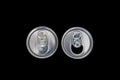 Top view of an unopened and opened metal can on dark background Royalty Free Stock Photo