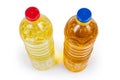 Top view of unrefined and refined sunflower oil in bottles