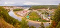 Top view of the Ural village STAROSUBHANGULOVO surrounded by the river Belaya among mountain peaks and taiga. Royalty Free Stock Photo