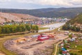 Top view of the Ural village STAROSUBHANGULOVO surrounded by the river Belaya among mountain peaks and taiga. Royalty Free Stock Photo