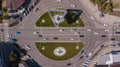 Top view of urban road traffic, roundabout, junction traffic cars