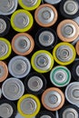 Top view of used alkaline batteries. Closeup of old AA batteries ready for recycling, colorful batteries - Image