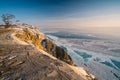 Top view of Uzury bay in a beautiful morning sunrise. Olkhon island in winter season. Baikal lake world biggest and deepest fresh