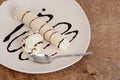Top view vanilla ice cream crepe with chocolate sauce and spoon Royalty Free Stock Photo
