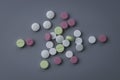 Top view of variety color of pills isolated on a grey background Royalty Free Stock Photo