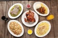 Top view of a variety of delicious meals served on a wooden table Royalty Free Stock Photo