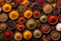 Top view of a variety of spices and seeds arranged in a row of small wooden trays, Ai-generated.