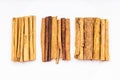 Top view of various cinnamon sticks on white plate Royalty Free Stock Photo