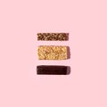 Top view of various healthy granola bars muesli, chocoltae, protein, see, cereal bars. Set of energy, sport, breakfast and