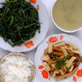 Vegan daily meal for lunch, boiled water spinach, skin tofu and copra cook with sauce, simple vegetarian Vietnamese food