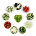 Top view vegetables bowls with heart shape lettuce isolated on w Royalty Free Stock Photo