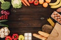 Top view of vegetables and fruits with bread and pasta on wooden table Royalty Free Stock Photo