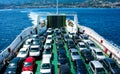 Top view of vehicles and passengers that use a ferry