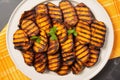 top view of a vibrant plate of mango bbq grilled plantains