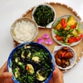 Vietnamese vegan cuisine, daily meal, seaweed, tofu soup, fried vegetables, dried bread cook with sauce, boiled water spinach Royalty Free Stock Photo