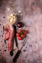 Top view on vintage board with pork tenderloin and other ingredients Royalty Free Stock Photo