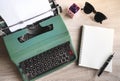 Top view vintage green typewriter on wooden table Royalty Free Stock Photo