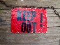 Top view of vintage Keep Out sign on wooden deck Royalty Free Stock Photo