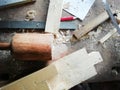 Top of view vintage old carpenter tools in a carpentry workshop, hand saw, home wood kit closeup Royalty Free Stock Photo