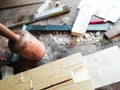 Top of view vintage old carpenter tools in a carpentry workshop, hand saw, home wood kit, closeup Royalty Free Stock Photo