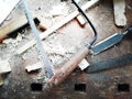 Top of view vintage old carpenter tools in a carpentry workshop, hand saw, home wood kit closeup Royalty Free Stock Photo