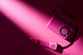 Top view of vintage pink telephone with shadow