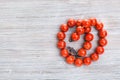 Top view of vintage red coral necklace on gray Royalty Free Stock Photo