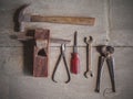 Top view of vintage tools on wooden