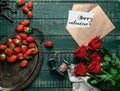 top view of vintage tray, red roses and envelope with Happy valentines day card Royalty Free Stock Photo