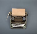 Top view of vintage typewriter on grey table