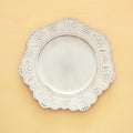 Top view of vintage white empty plate. Flat lay. Royalty Free Stock Photo